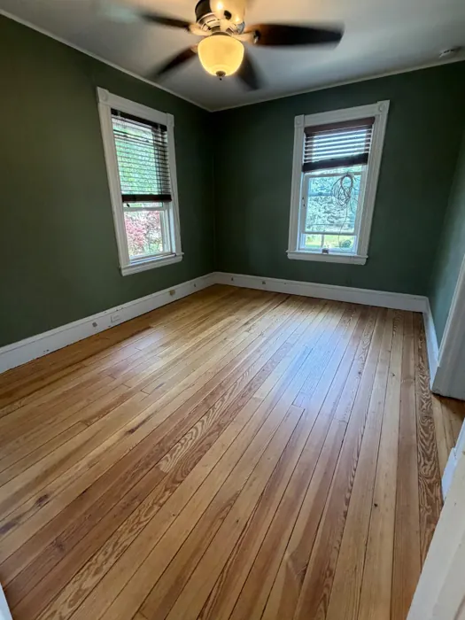 Third bedroom with heart pine floors