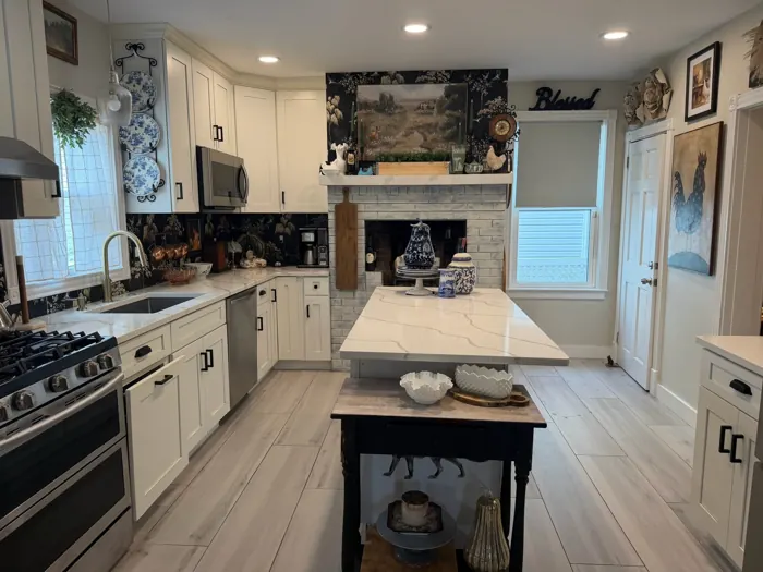 Kitchen with island and gas range