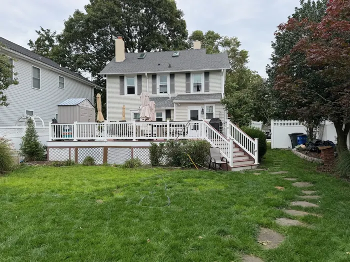 Rear deck and level backyard