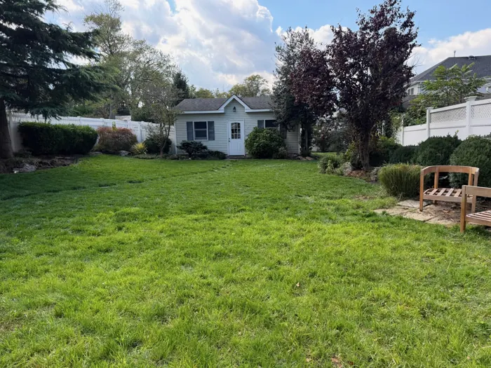Detached garage and garden seating